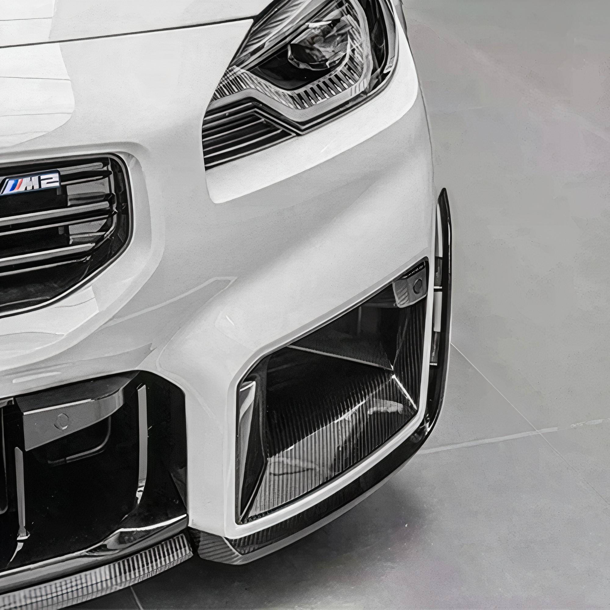 bmw m2 g87 mp style carbon fiber air ducts installed close up